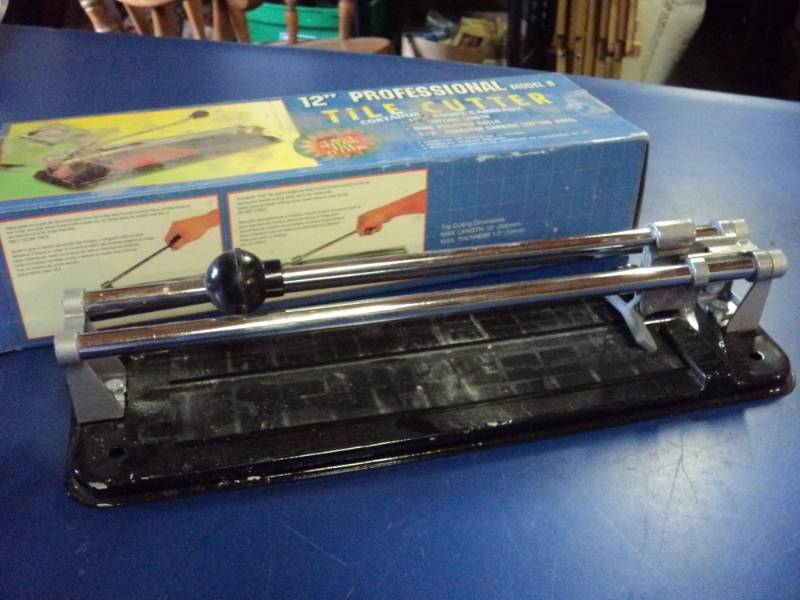 lot 7838 image: 12 Professional Tile Cutter Model B, Used