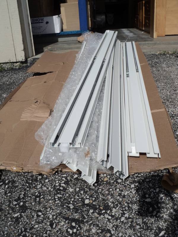 lot 7791 image: (8) ct patio door track vinyl, off-white, 4-34 x 68