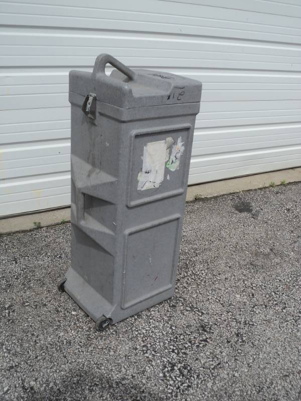 lot 7846 image: Gray Plastic Case approx 14 x 14 x 37, handle (2) wheels, working latch