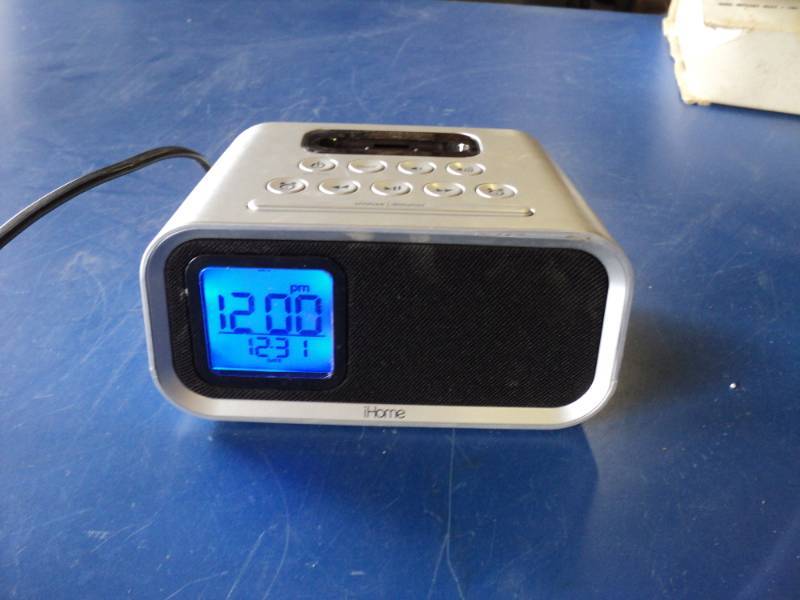 lot 7901 image: iHome Alarm Clock w MP3 dock, 120 volt, powers on or takes (3) AAA batteries