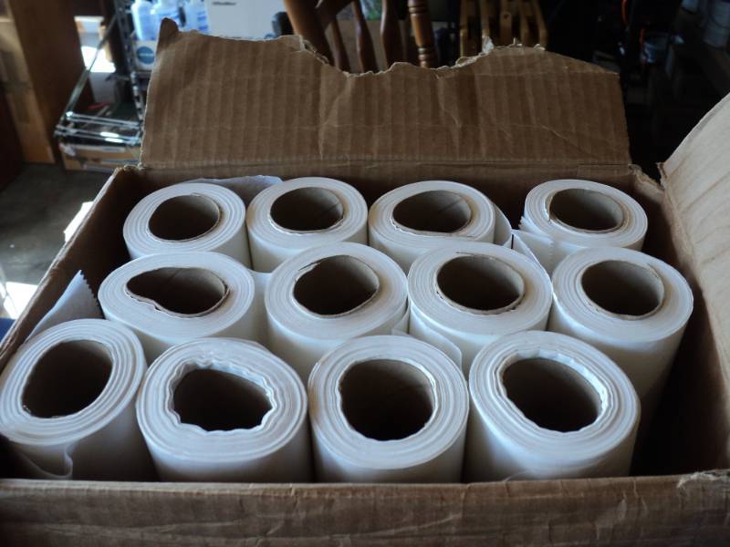 lot 7959 image: (1) case of (12) Smooth Exam Table Paper, each roll is 18 x 225