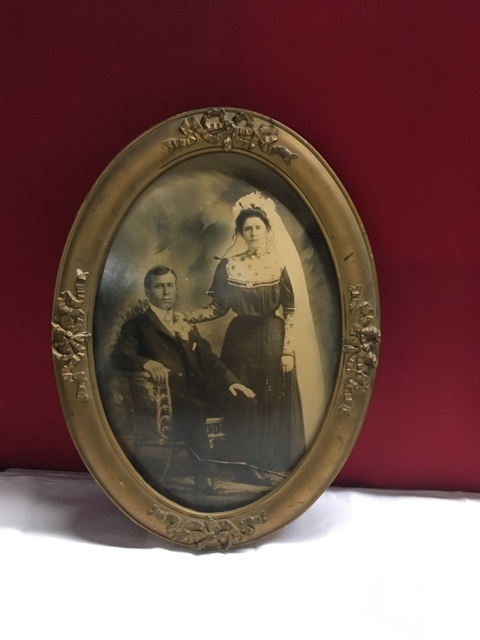 lot 3656 image: Vintage Oval Framed Wedding Picture