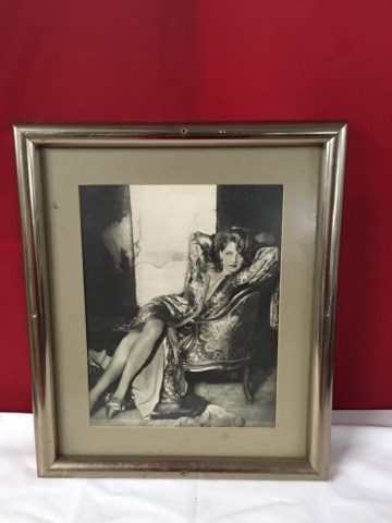 lot 3734 image: Framed Picture of Classic Movie Star on Couch