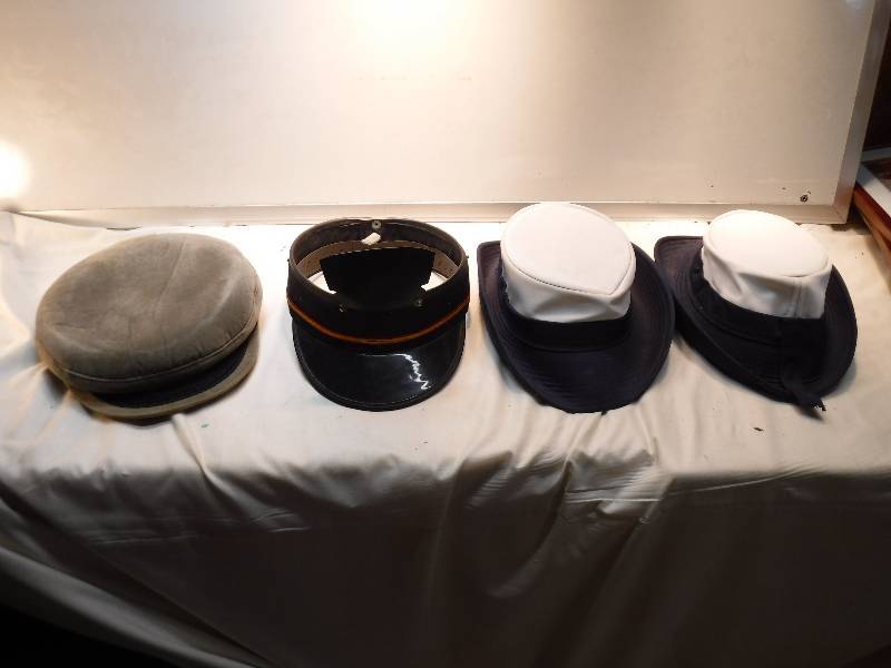 lot 4365 image: 2 Vintage originals by Sarah W hats, 1 touring cap and one train engineer visor