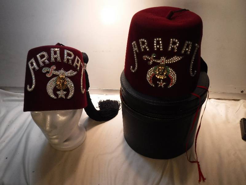 lot 4371 image: 2 Ararat shriner bejeweled fez hats with a case
