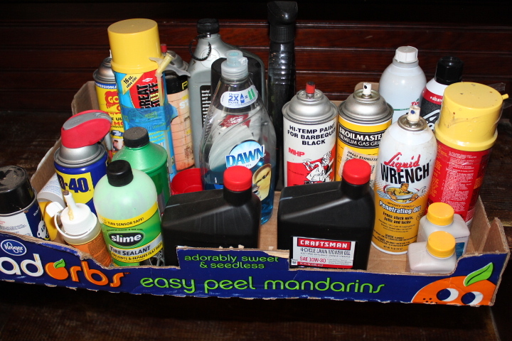 lot 5832 image: Box of Oil, Tire Slime, WD-40 and Foam Sealant
