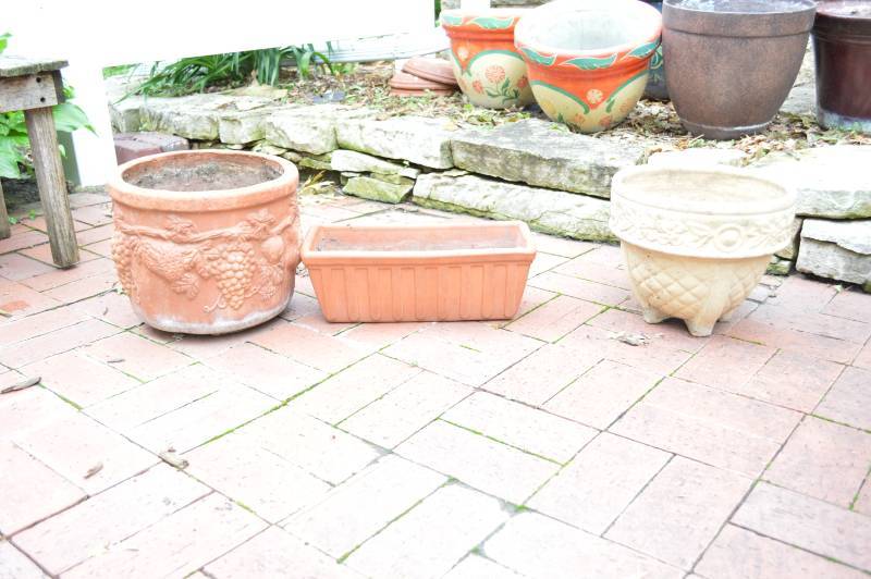 lot 5799 image: 3 Planters - 2 are Terra Cotta, 1 is Cement