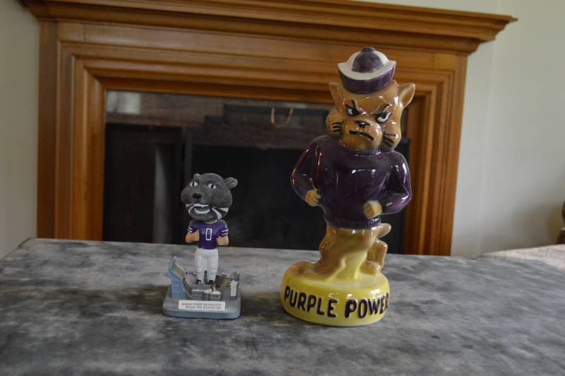 lot 5644 image: Purple Power Decanter and Bobble head