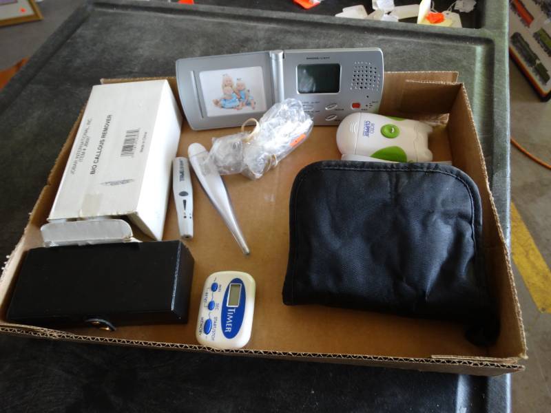 lot 17395 image: True track monitor, electric nail trimmer, callous remover and more.