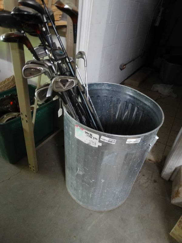 lot 17476 image: Golf clubs wmetal trash can.