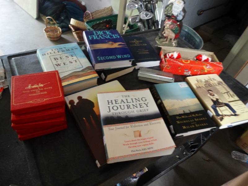 lot 17491 image: Large lot of books, christmas decor, power cords, hardware & more.