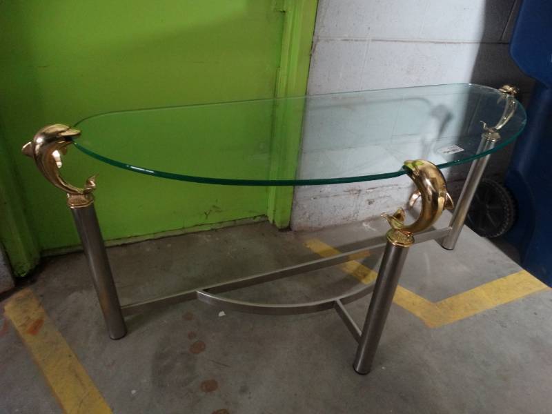 lot 17602 image: Glass top dolphin sofa table.