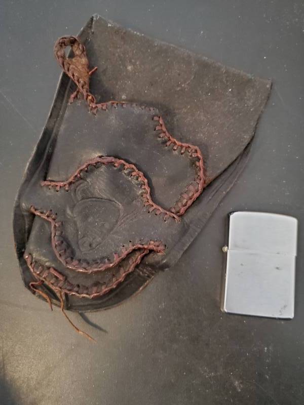 lot 13665 image: Toy Holster and Zippo Lighter