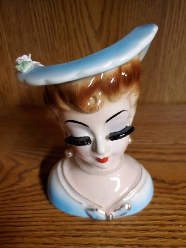 lot 13763 image: Blue Lady Head Vase