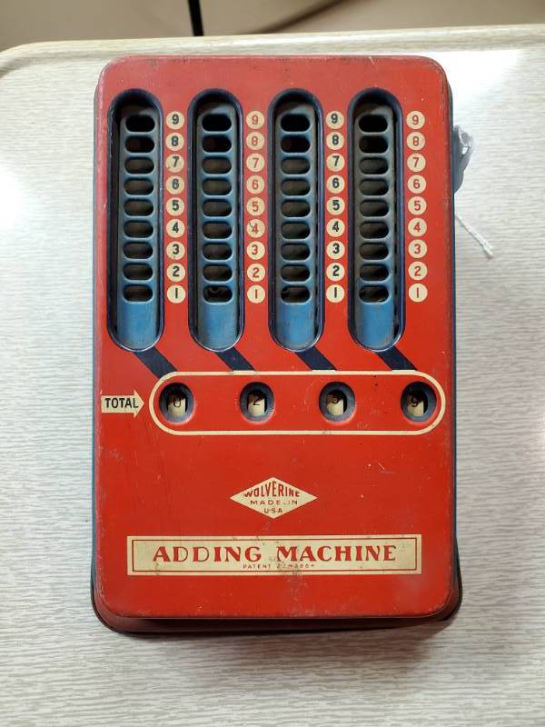 lot 13801 image: Vintage Wolverine Adding Machine Metal