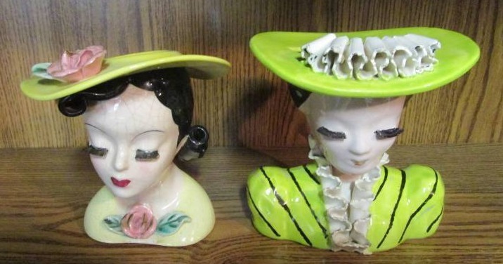 lot 13766 image: Pair of Pink and Yellow Lady Head Vases