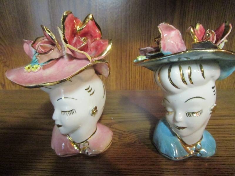 lot 13770 image: Two Lady Head Vases Pink and Aqua