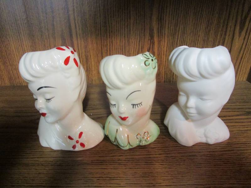 lot 13776 image: Three Lady Head Vases