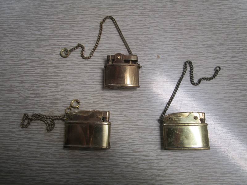 lot 13812 image: Three Vintage Lighters