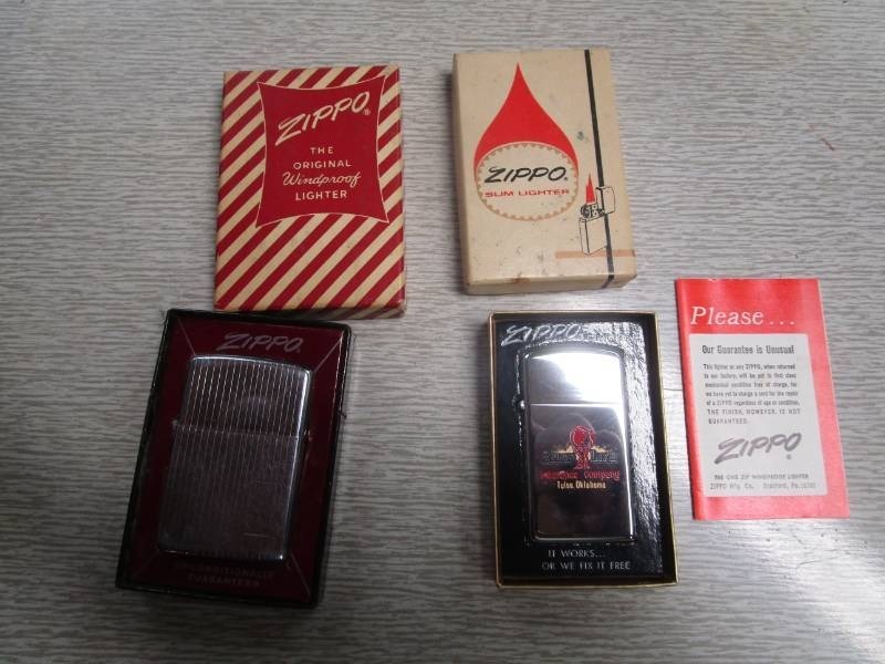 lot 13838 image: Two Zippos with Boxes and Paperwork