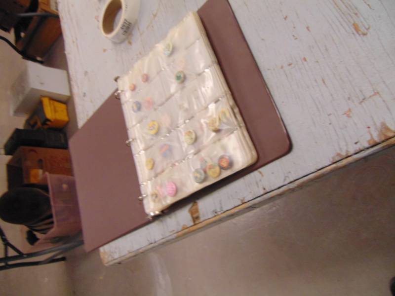 lot 4936 image: Binder Full of Vintage Pin Back Buttons