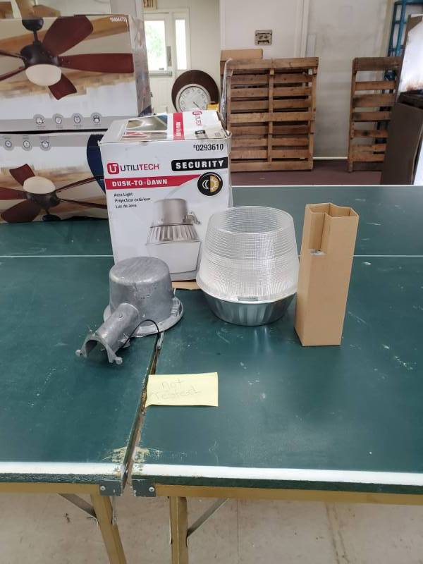 lot 6116 image: Utilitech Dusk to Dawn Area Light Appears New No Further Testing