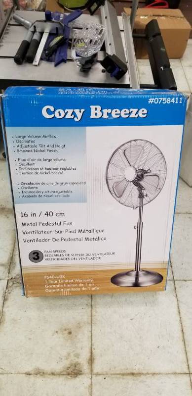 lot 6049 image: Cozy Breeze 16 Stand Fan Metal Appears New No Further Testing