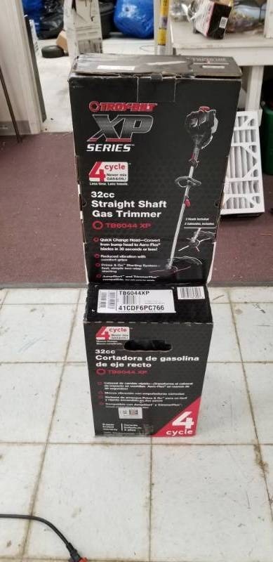 lot 6008 image: Troy Built 4 Cycle 32cc Straight Shaft Gas Trimmer - Appears New Not Tested