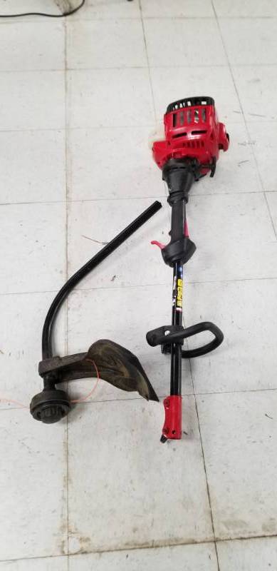 lot 2307 image: Troy-Bilt Weed Eater Has Compression No Further Testing