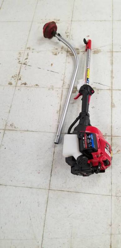 lot 2309 image: Troy-Bilt Weed Eater Has Compression No Further Testing