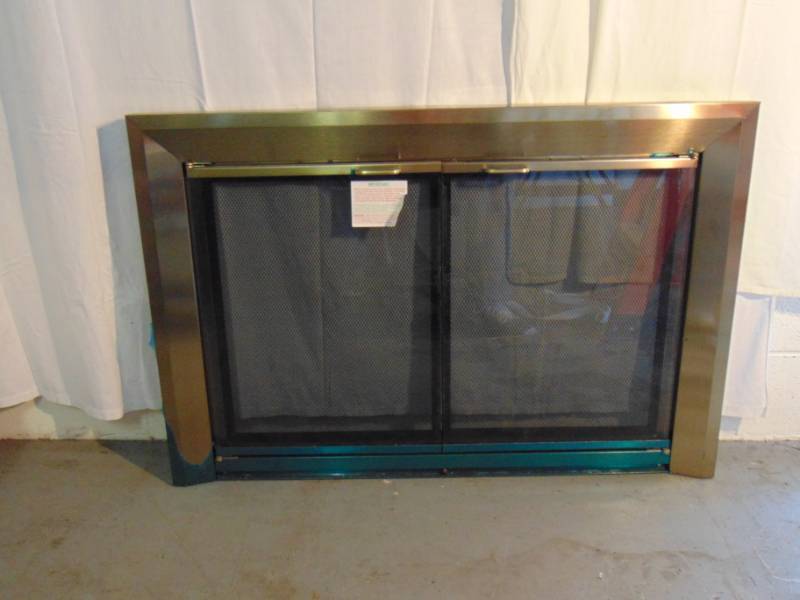 lot 14462 image: New Fireplace Cover, Has Glass doors, Mesh metal screen doors
