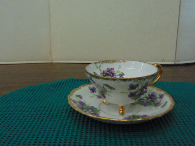 lot 14545 image: Footed teacup and saucer