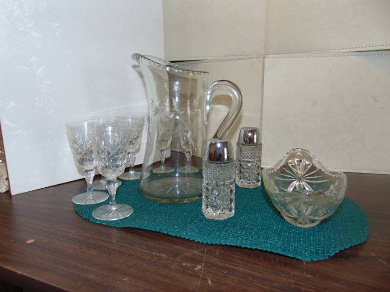lot 14584 image: Glass Pitcher with 6 Glasses, salt and pepper shakers and candy dish