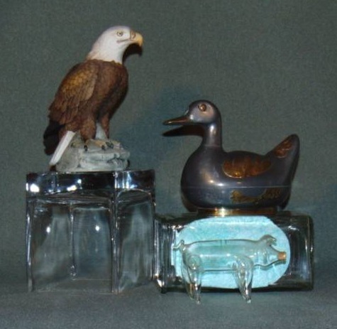 lot 10013 image: Bald Eagle by Andrea Numbered, Metal Trinket Box Duck, Glass mini Pig with cork