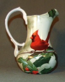 lot 14534 image: Hautmann Brothers Cardinal in Holly  Porcelain Pitcher