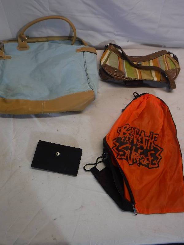 lot 12106 image: Tote bag, purse, wallet and cinch style backpack bag