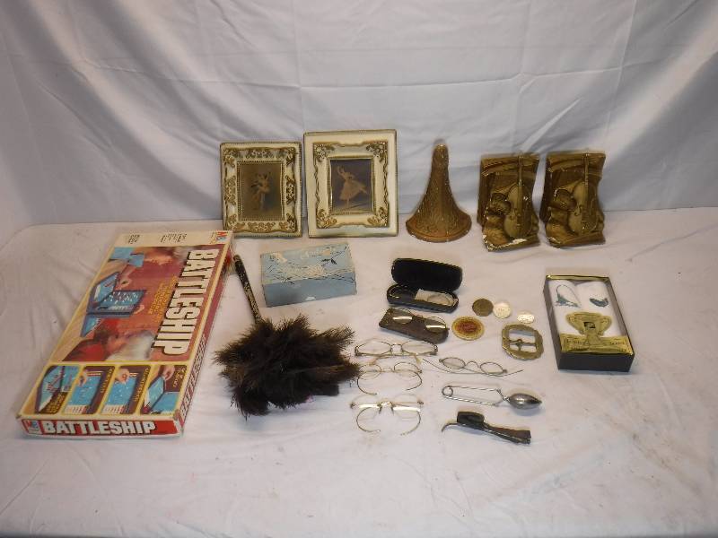 lot 12088 image: Battleship game, old wire framed glasses, bookends and more