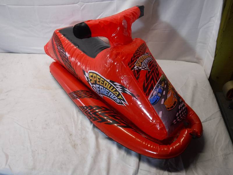 lot 12054 image: Inflatable jet ski toy