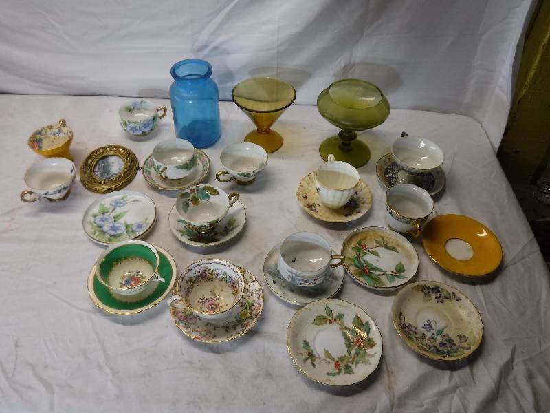 lot 12113 image: Tea cups with saucers, some are very dainty along with some glassware