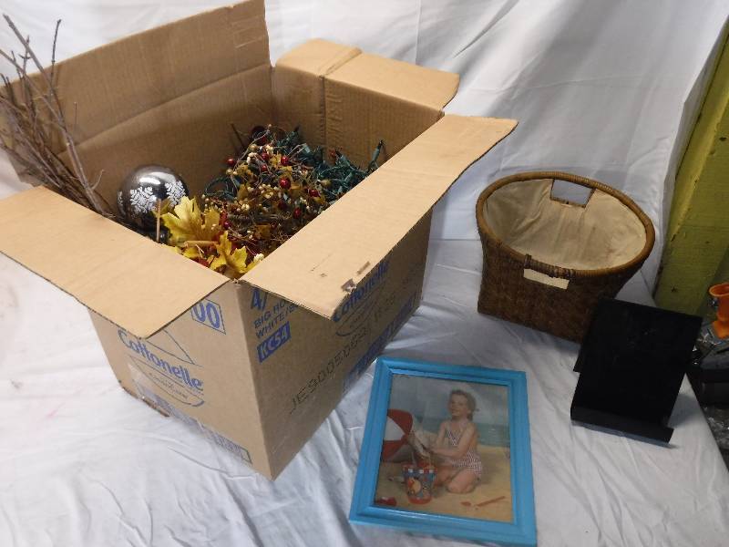 lot 12118 image: Lined wicker basket, beach picture and a box of floral items