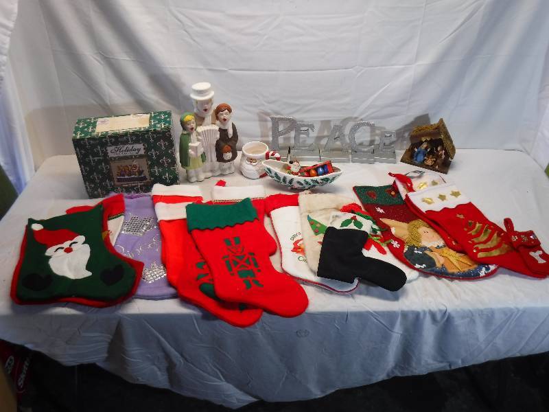 lot 12020 image: Christmas lot includes stockings and santa mug