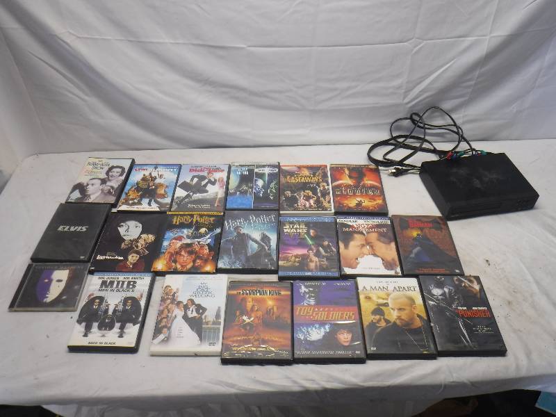 lot 12172 image: Sanyo DVD player and movies
