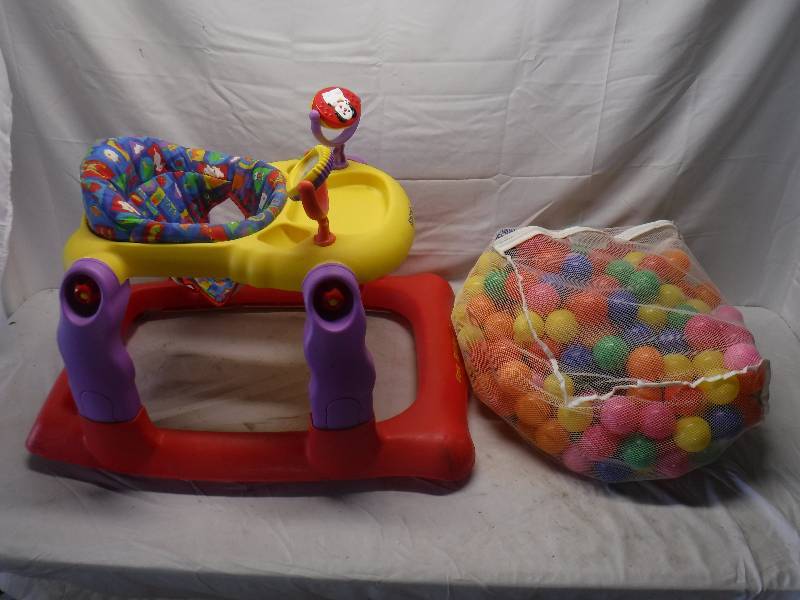 lot 12152 image: Baby bouncer toy and a bag of ball pit balls