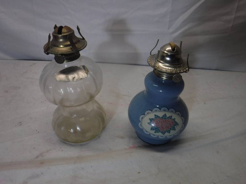 lot 12202 image: pair of oil lamps
