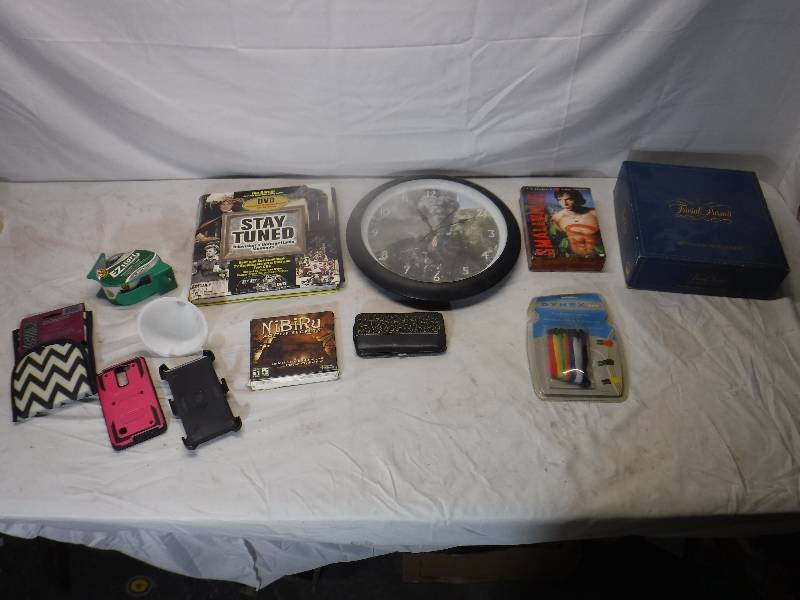 lot 12204 image: Phone cases, wall clock and more