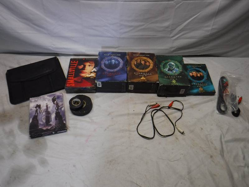 lot 12218 image: DVD movies, includes smallville and stargate