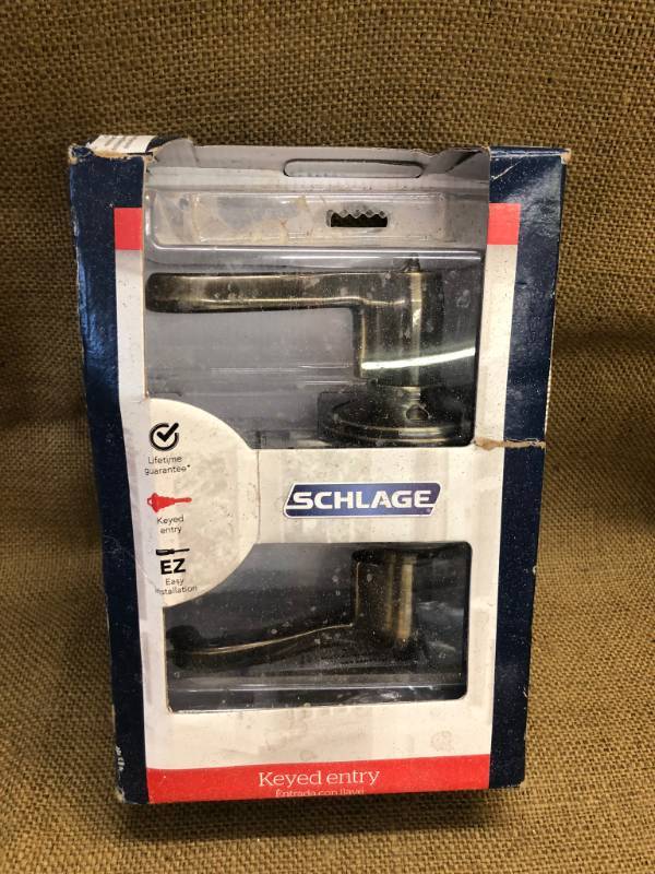 lot 1441 image: Schlage Key Entry - Style Flair Lever - Original Packaging