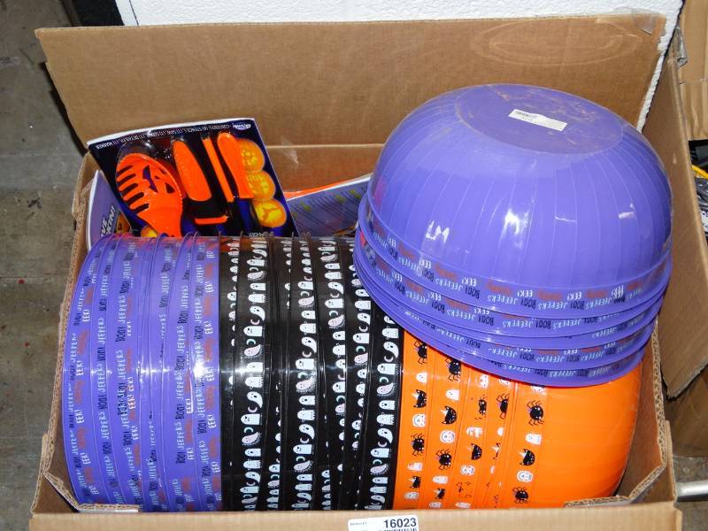 lot 16023 image: Box of halloween bowls and pumpkin carving kits.