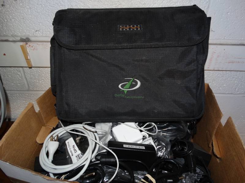 lot 16044 image: Computer cords and a bag.