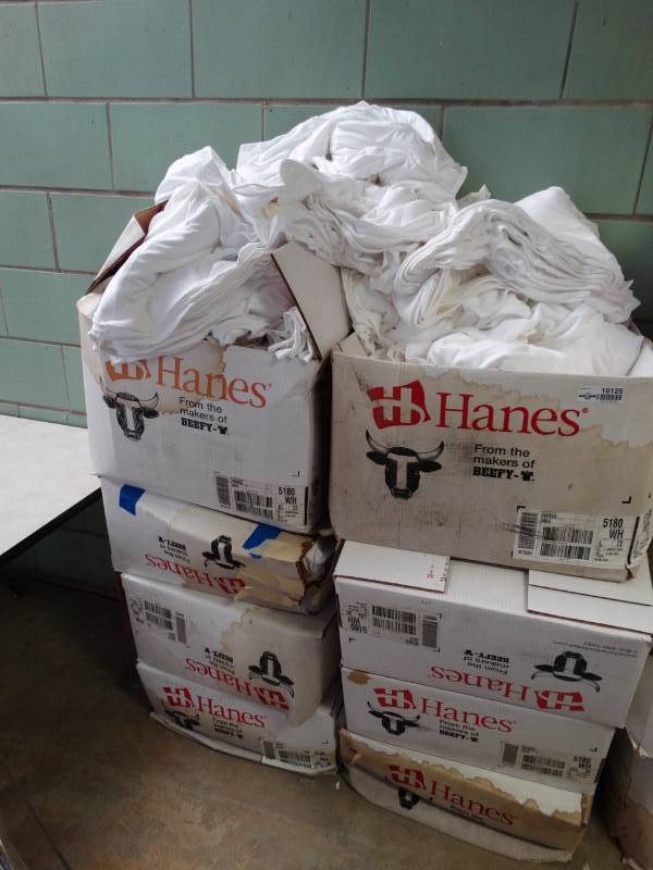 lot 16125 image: Large lot of white shirts.
